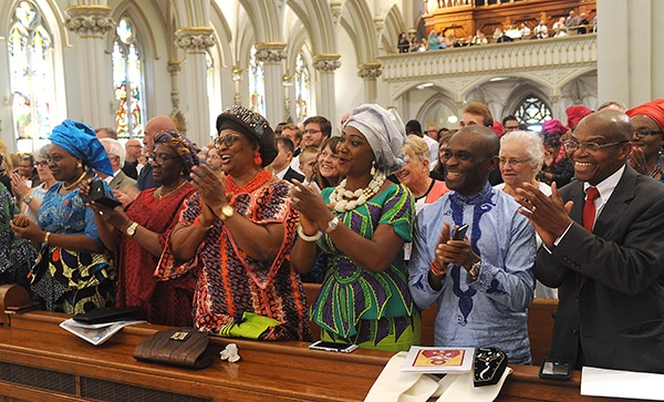 All the way from Nigeria, the family of Father Peter Nsa Bassey express their joy as Bassey and three others Deacons were ordained Saturday morning during Mass at St. Joseph Cathedral. (Dan Cappellazzo/Staff Photographer)